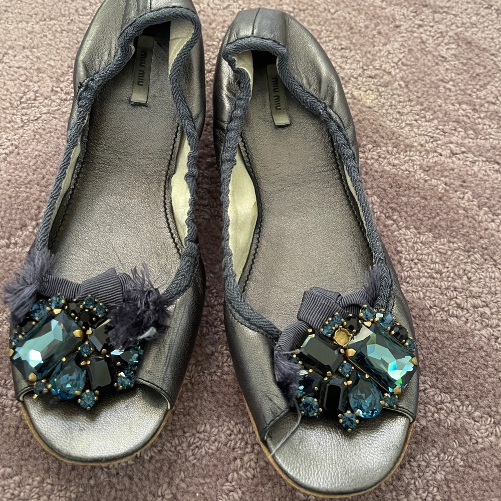 Blue Miu Miu Ballet slippers. Metallic blue!!! Can be worn dressed up or down.
